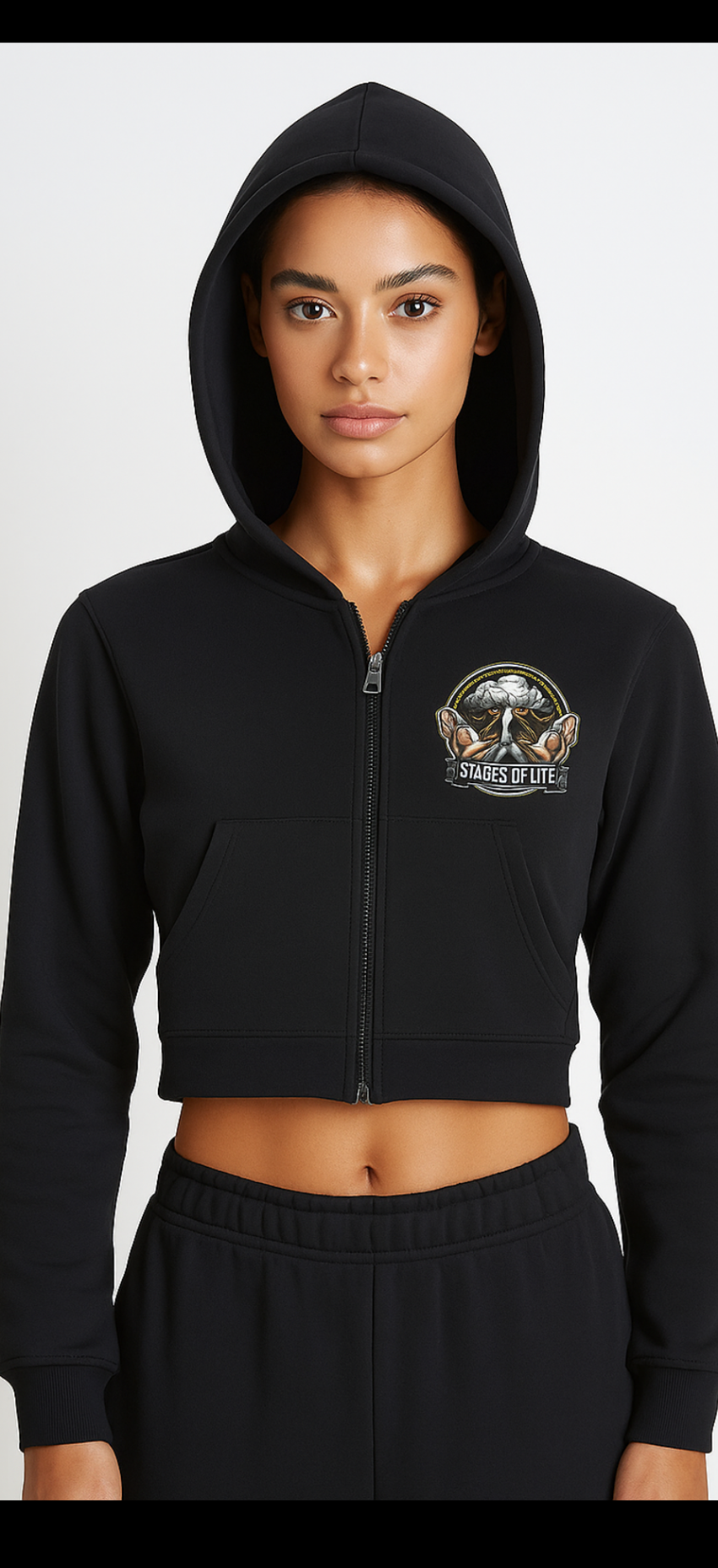 Person wearing a black hoodie with a logo on a white background